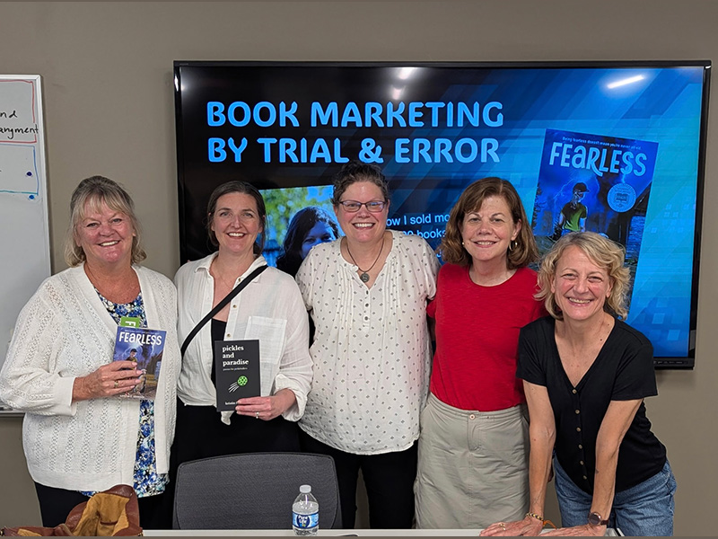 Sharing book marketing tips while presenting to friends in SCBWI: Kathy Groth, Megan Maynor, Susan Latta, and Aimée Bissonette